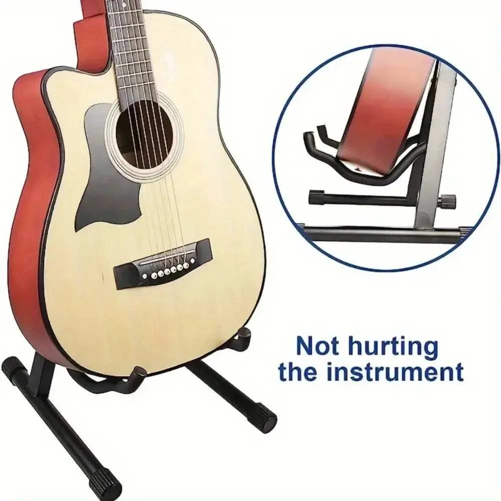 Acoustic guitar on a black metal stand with protective padding, close-up detail shown
