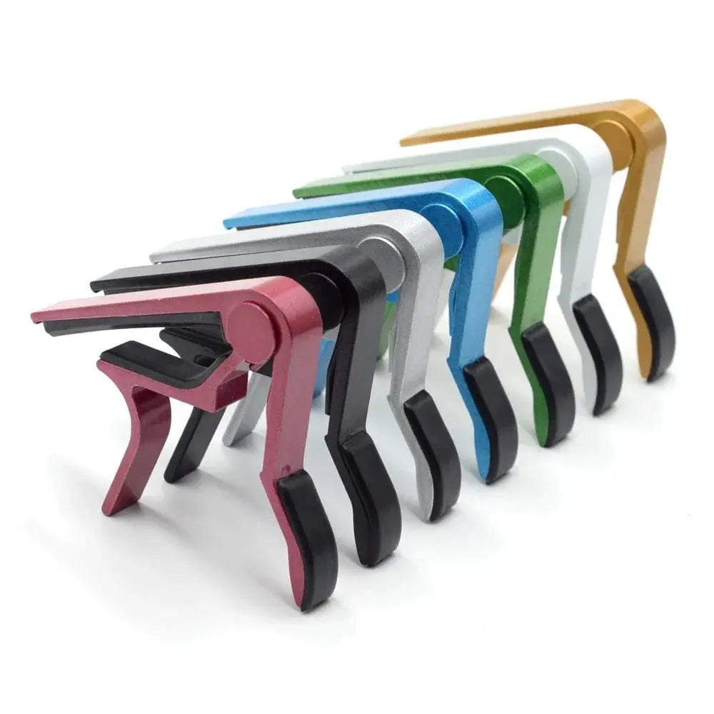 Guitar capo for string instruments
