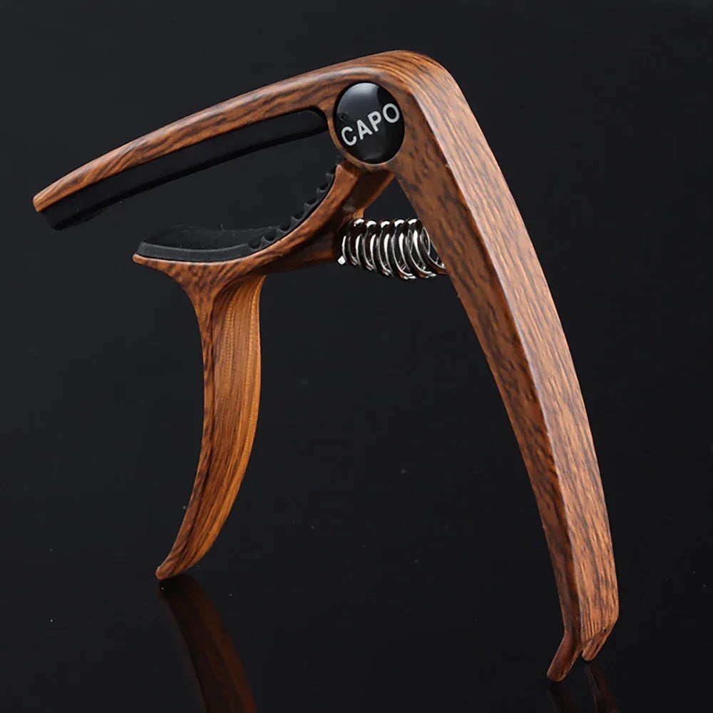 dark wood guitar capos