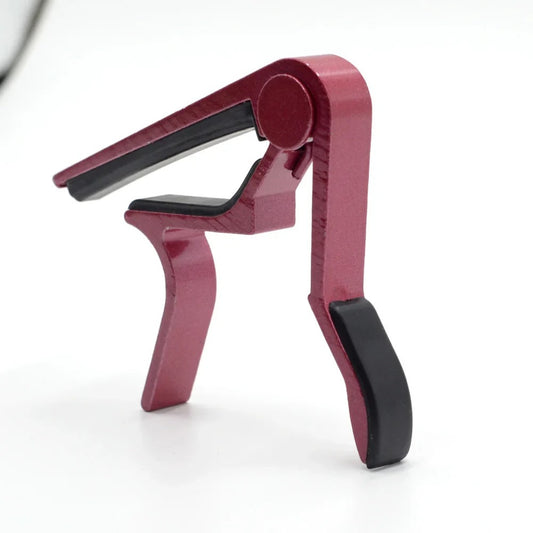 Guitar capo for string instruments